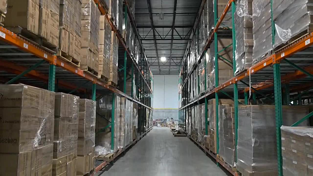 Stocked pallets staged for store distribution